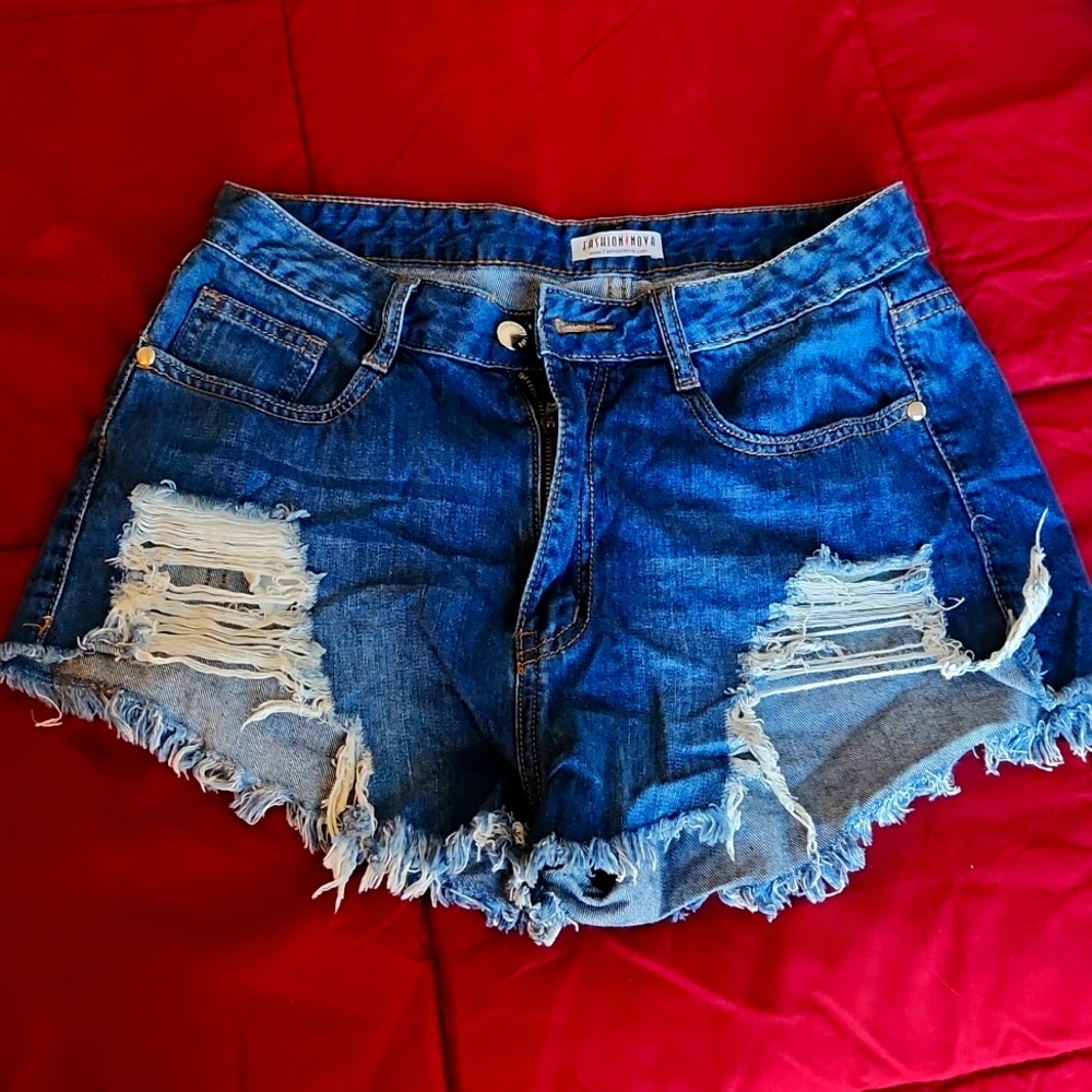 Distressed [dark wash] denim shorts